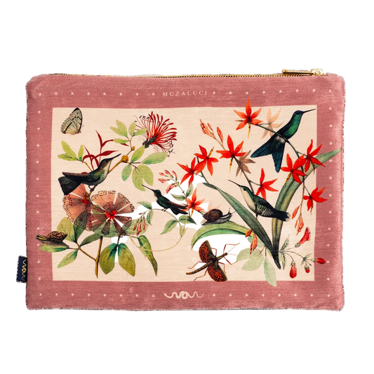 A handbag with a floral pattern featuring birds and butterflies, predominantly in pink tones.